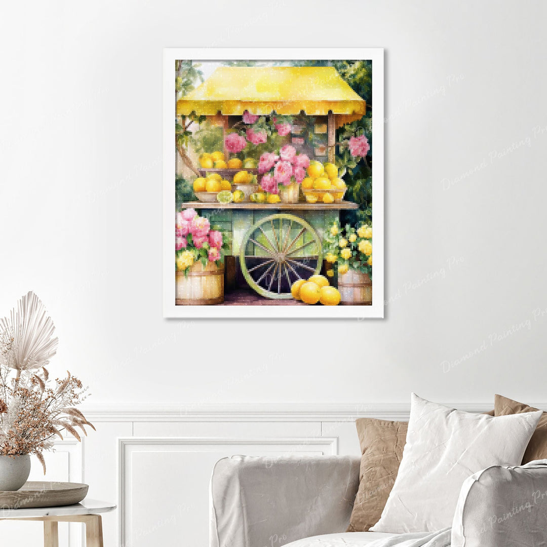 Sunny Lemonade Stand Finished Diamond Painting Displayed with White Frame as Home Decor